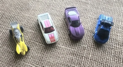 4 1990s Hot Wheels Cars Ferrari 348, Blue Bandit, Purple Camaro, Pipe Jammer - Image 1 of 4