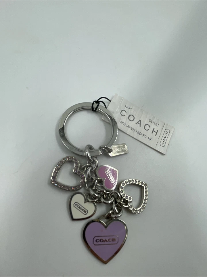 Bolso Cartera Coach Rosa Cristal Piedra Corazones Llavero FOB Dije Tono Plateado Púrpura Foto 1 de 4