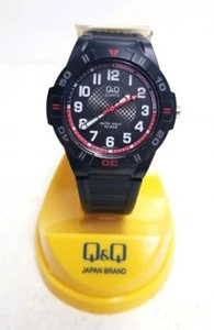 Q&Q Japan Orologio da polso da uomo analogico leggero in gomma - Foto 1 di 5