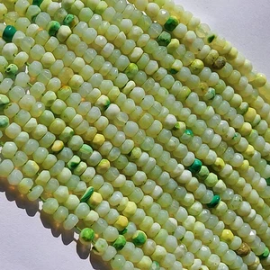 Rondelle facetado ópalo amarillo-verde sombreado punto verde/4,5 y 5 mm/12,5"/RJS-749 - Imagen 1 de 18