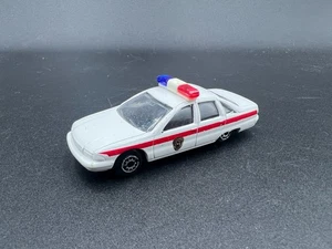 Maisto Chevrolet Chevy Caprice Polizeiauto weiß China 1/64 guter lose Zustand - Bild 1 von 4