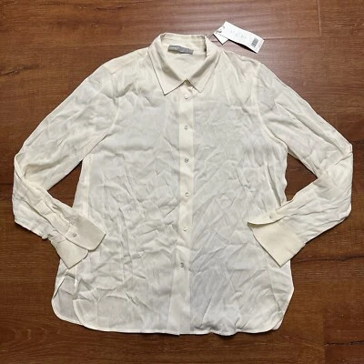 Blusa Vince com botões L marfim seda manga longa luxo carreira chique $295 - Imagem 1 de 4