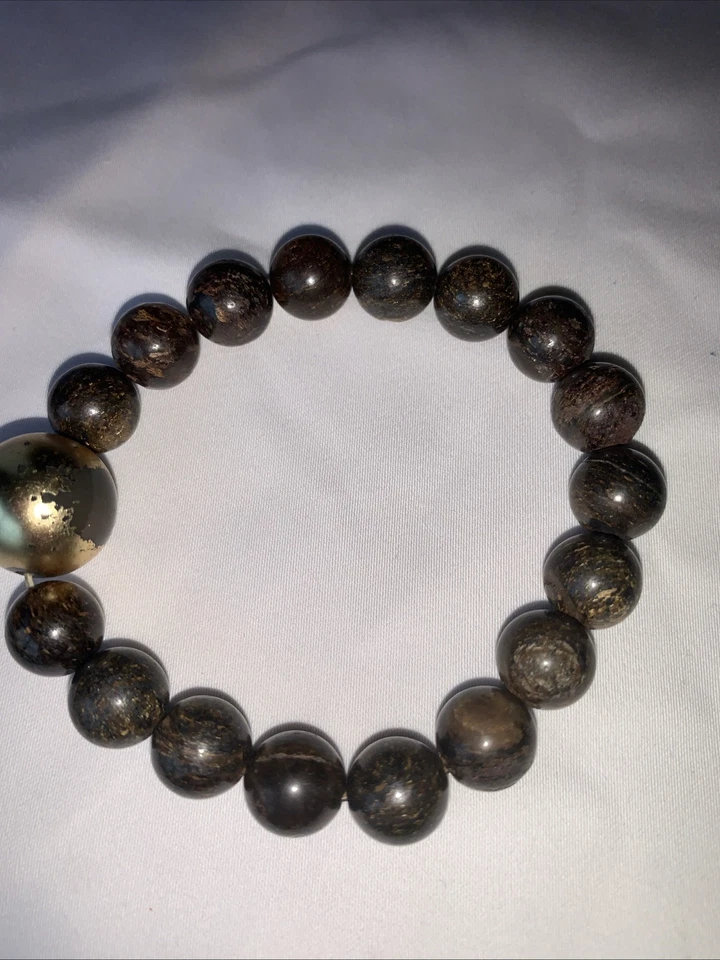 Винтажный бронзит камень эластичный браслет до 7,25 дюймов золотой бусина имеет износ - Изображение 1 из 4