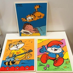 3 Vintage Playskool Wooden Puzzles Papa Smurf (12 pc) Garfield (7pc) Rick (7pc) - Picture 1 of 4