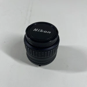 Nikon AI-S Objektiv 100 mm f/2,8 + Filter - Bild 1 von 4