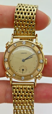 Reloj Longines Vintage Oro 14K Asas Anudadas con Bisel de Diamantes 29mm Foto 1 de 4