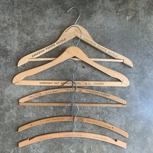 Lot 5 Vintage Wooden Clothes Hangers with Advertising - Canada, Hilton, Portland - Picture 1 of 8
