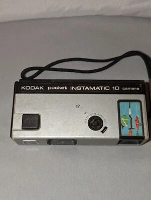 Vintage Kodak Pocket Instamatic 10 Camera with Wrist Strap. Rod & Lure Sticker. - Image 1 of 4