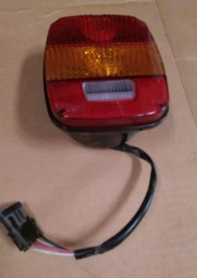 HUMMER H1 HumveeTAIL LIGHT ASSY MULTI FUNCTION 6008352 - Image 1 of 2