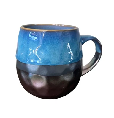 Caneca de café Sarah By Signature iridescente azul brilhante redemoinho fundo tom cobre - Imagem 1 de 4