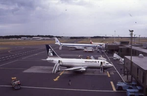 BRITANNIA AIRPLANE AT NEWCASTLE AIRPORT - C1990 - 35MM SLIDE PHOTO - REF E21 - Picture 1 of 1