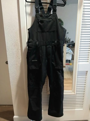 Nice VOLCOM Black SNOWBOARDING ski OVERALLS Pants Men's size SMALL - Image 1 of 4