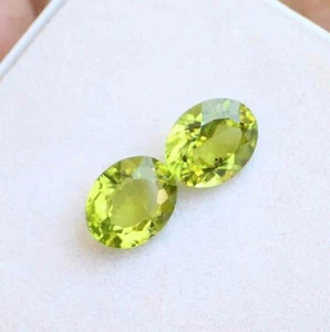 Par de piedras preciosas sueltas corte facetado ovalado peridoto natural gato 5,40 8*10 mm 2 piezas - Imagen 1 de 3