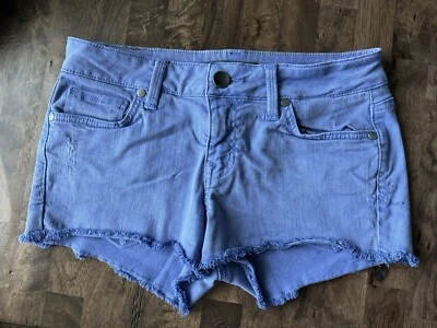 Pantalones cortos de mezclilla Anthropologie Level 99 azul púrpura borde flecos tiro bajo talla 28 Foto 1 de 4