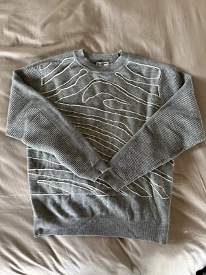 Suéter de lana de ceremonia de apertura Foto 1 de 4