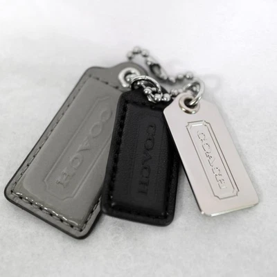 Coach 3 Pastillas Logo Etiquetas Gris/Negro/Plateado Llavero NUEVO Foto 1 de 3