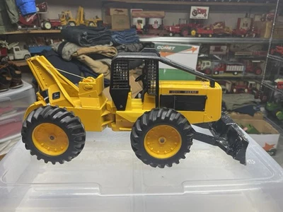 Tractor de juguete patinador de troncos John Deere vintage ERTL modelo 590 escala 1/16 amarillo Foto 1 de 4