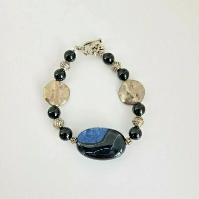 Pulsera con memoria de cuentas de vidrio de piedra natural azul y negro palanca tono plata Foto 1 de 4