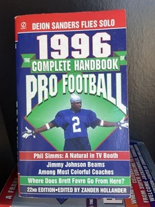 The COMPLETE HANDBOOK of PRO FOOTBALL Zander Hollander 1996 Deion Sanders - Picture 1 of 1