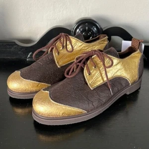 Zapatos de chocolate Tooche dorados - Imagen 1 de 12