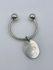 Tiffany & Co. Auténtico llavero con etiqueta ovalada de plata de ley - Imagen 1 de 3