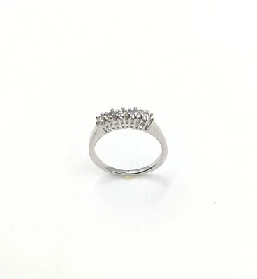 TRILOGY CON 5 ZIRCONI IN ARGENTO 925 RODIATO IN ORO BIANCO 18 KT - Immagine 1 di 4