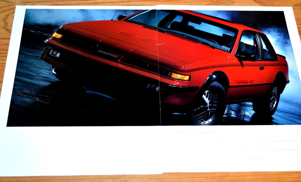 1986 PONTIAC SUNBIRD TURBO GT ORIGINAL DEALER ADVERTISEMENT AD 86 RED - Image 1 of 1