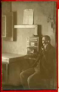 LATVIA LETTLAND MAN AND PHONE STATION VINTAGE PHOTO POSTCARD 723 - Picture 1 of 2