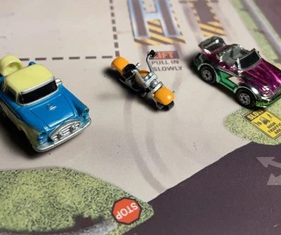 MicroMachines Scaled Harley (orange/black) OTHER VEHICLES NOT INCLUDED - Image 1 of 4