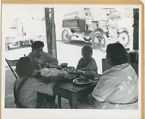 A Paiute American Indian Family dining outside their home, Circa: 1940 - Picture 1 of 1