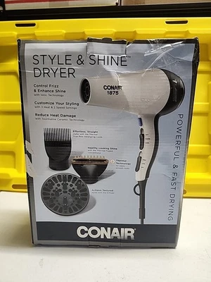 Secador de pelo estilo y brillo Conair 1875 vatios, potente y de secado rápido. Caja dañada  Foto 1 de 4