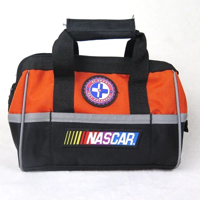Bolso de Primeros Auxilios NASCAR Bolso de Lona Sin Usar Naranja y Negro Bolsillos Laterales con Asas Foto 1 de 4