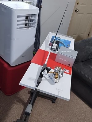 Nova vara de pesca giratória 13 Rely preta 6'7" MH 10-20 lb e molinete Kalon 4.0 - Imagem 1 de 4