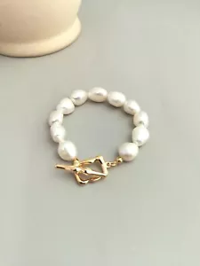 Armband aus 18 Karat vergoldet 925 Sterling Silber mit Süßwasserperlen - Bild 1 von 5