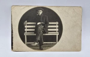 Handsome Man sitting Pipe smoking Reading Book -1920’sRPPC Postcard UNPOSTED - Picture 1 of 2