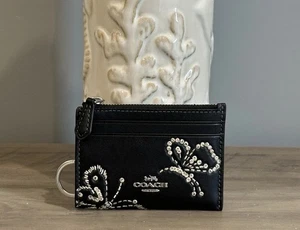 Coach CCM78 Mini schmale Ausweisetui Schmetterlingsmuster Leder Karten Geldbörse silber/schwarz - Bild 1 von 9