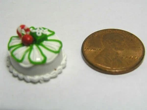 Dollhouse Miniature 1/2" Scale Christmas Cake round White w/ Green trim #007 - Picture 1 of 1
