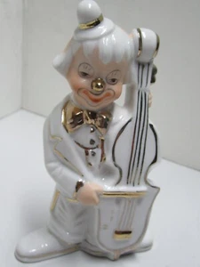 vintage figurine of  Porcelain white clown playing the bass cello - Picture 1 of 5