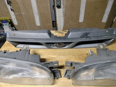 OEM 1993-1996 Subaru Impreza GC8 Headlights L&R With Grill Lamp Lights Glass - Image 1 of 4