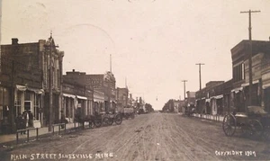 Cartolina d'epoca 1907 Janesville Minnesota Main Street RPPC - Foto 1 di 6