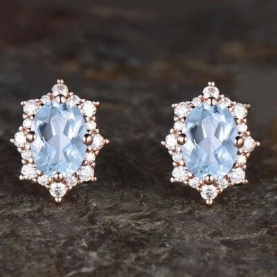 Arete de oro rosa macizo de 14 quilates con forma ovalada de aguamarina natural y diamantes de 4,96 quilates Foto 1 de 4