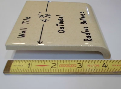 1 pc. Oatmeal: Glossy Ceramic Radius Bullnose tile 4-3/8" Speckled Beige Defects - Image 1 of 4