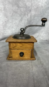 Antike Imperial Arcade Manufacturing Co. Kaffeemühle mit Figur Vintage - Bild 1 von 13