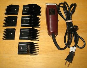 Oster 23-51F Fast Feed Hair Clipper with 7 Clipper Combs