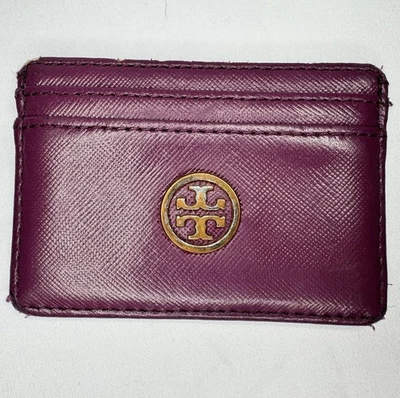 Tarjetero Robinson de cuero morado Tory Burch. Foto 1 de 4