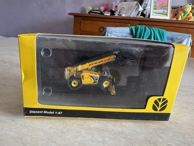 MEZZO DA LAVORO STRADALE NEW HOLLAND ESCAVATORE GOMMATO 1:87 NUOVO DA COLLEZIONE - Immagine 1 di 4