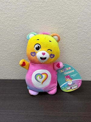 Peluche Squishmallows HugMees Care Bears 6 pulgadas - Togetherness Bear Foto 1 de 4