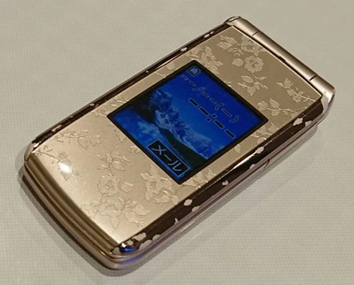 Teléfono Fujitsu Docomo Raku F-09B Rosa Comunicación Confirmado Japón Teléfono Abatible Foto 1 de 4