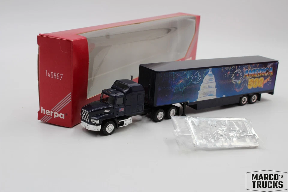 Camión semirremolque Herpa MACK CH600 caja "500 años América" 140867 1:87/H22422 Foto 1 de 1