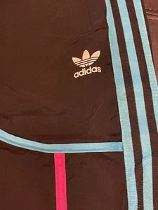 Pantaloni da pista reversibili nuovi ADIDAS McDonald’s esclusivi tutti i giochi americani LgTL - Foto 1 di 5